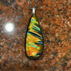 Handcrafted teardrop-shaped dichroic glass pendant necklace gold turquoise blue